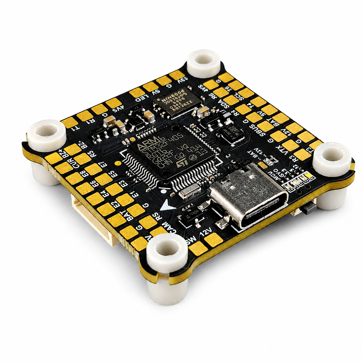 FlyFishRC F405 flight controller top and side view showing UART and solder pads